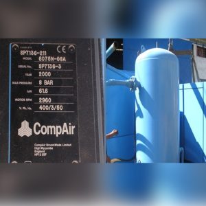 A close-up shows the nameplate of a Used Compair Air Compressor Auxiliary for a Taurus 60 GTG Plant on the left, while a large blue compressor tank stands outside on the right.