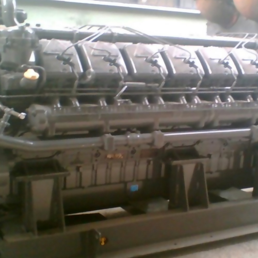 A 1 Set of TBD18V620 Deutz used and repaired Diesel Genset is shown with multiple cylinders and components, mounted on a sturdy metal base in an outdoor setting.