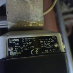 Close-up of a refurbished SOLD TRAFAG 414 INDUSTAT 1 (20 to 150°C/53279) Temperature and Pressure Thermostat, showing technical specs, serial number, and electrical ratings on the label. Mounted on a metal bracket.