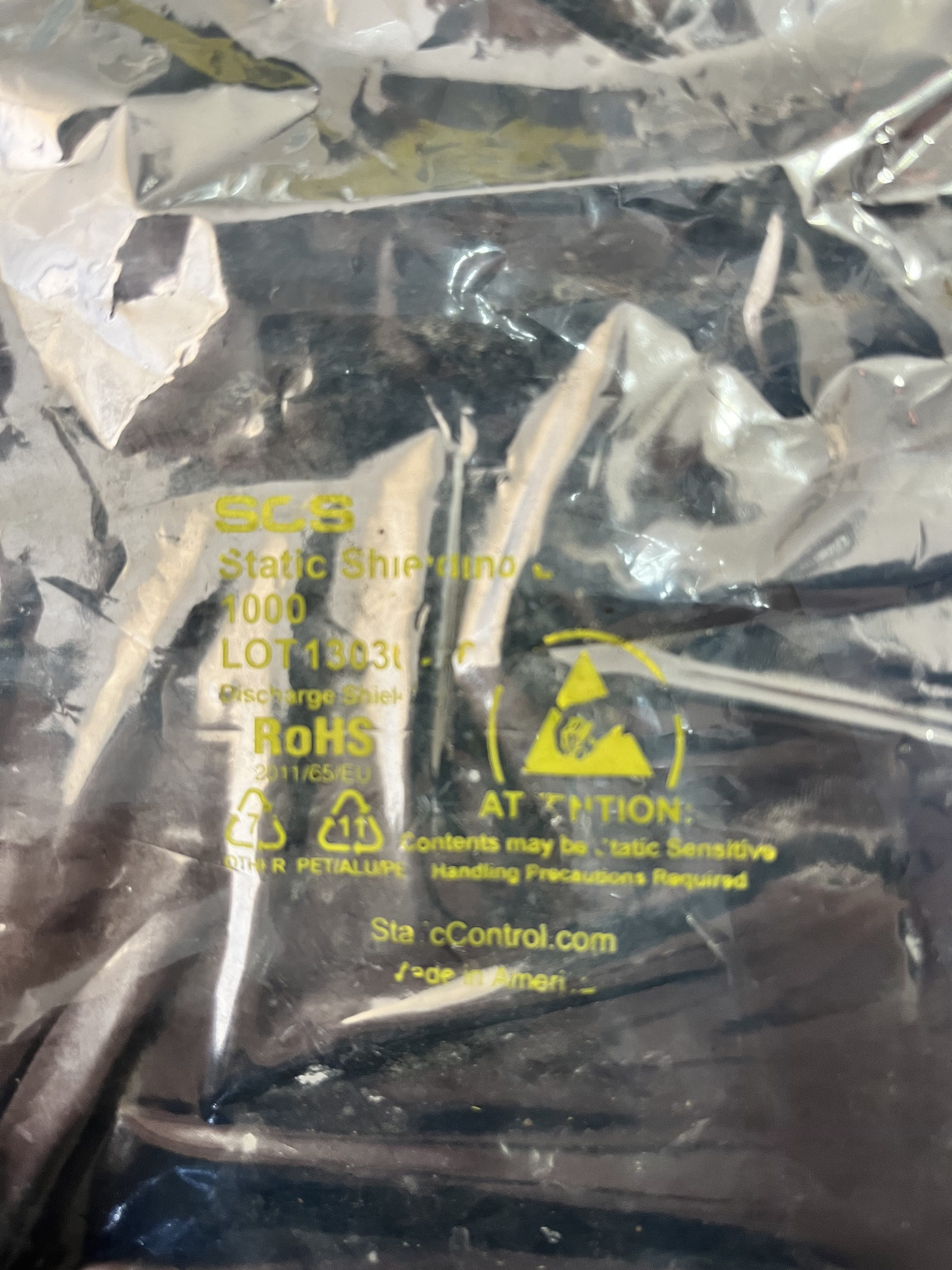 A silver anti-static bag labeled “Static Shielding Bag” with caution, LOT number, ROHS, and recycling symbols—ideal for storing a Used GE Energy IS420UCSBH4A UCSB Controller Module or other electrostatic-sensitive devices.