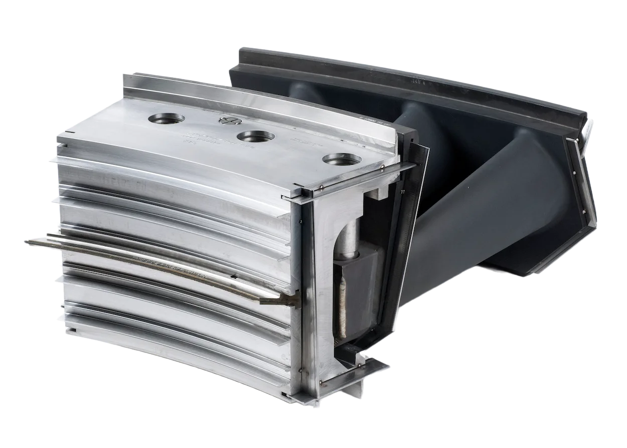 A close-up of two metallic turbine blades with curved, aerodynamic surfaces and precise details—one displays an internal cooling channel—ideal for 9E - Refurbished Stock Frame 9E Capital Parts applications.