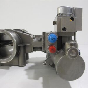 A close-up of an available L47328P02 Overhauled Thrust Balance Valve for the LM6000 Gas Turbine, with colored control knobs and a round chamber, displayed on a white surface.