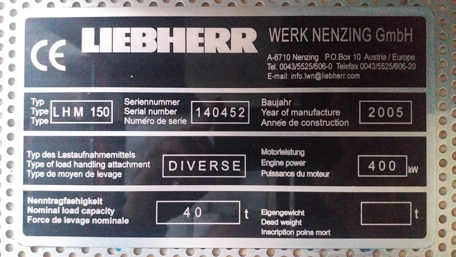 Metal identification plate for AVAILABLE LIEBHERR MOBILE HARBOUR CRANE LHM150 displays key specs: serial number 140452, year 2005, engine power 400 kW, load capacity 40 t, plus multilingual info.